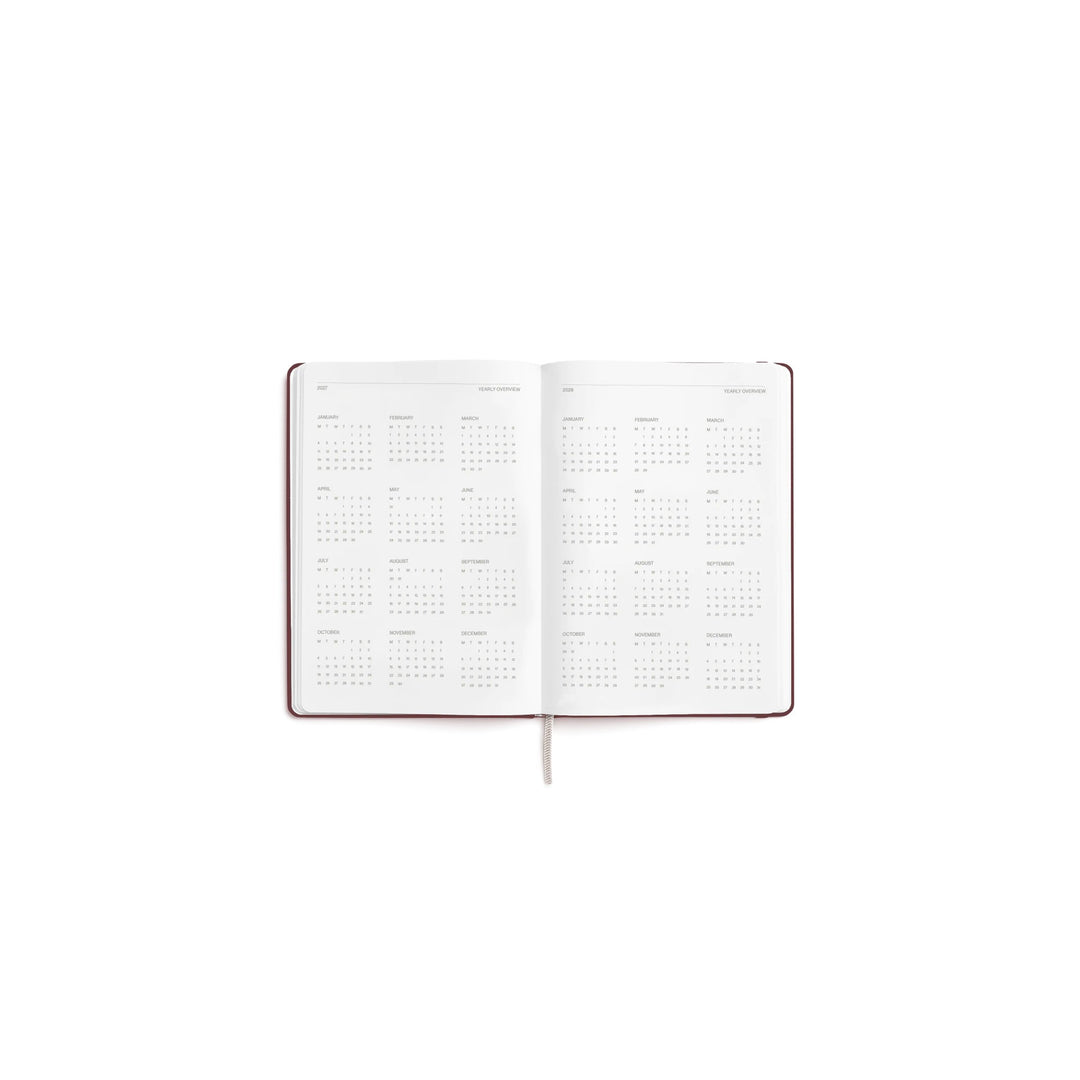 Wochenplaner 2027 – Steinpapier · A5 Hardcover · Burgundy | Karst