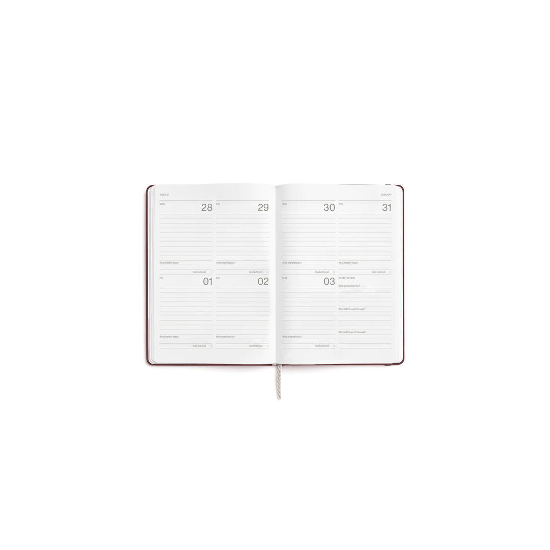 Wochenplaner 2027 – Steinpapier · A5 Hardcover · Burgundy | Karst