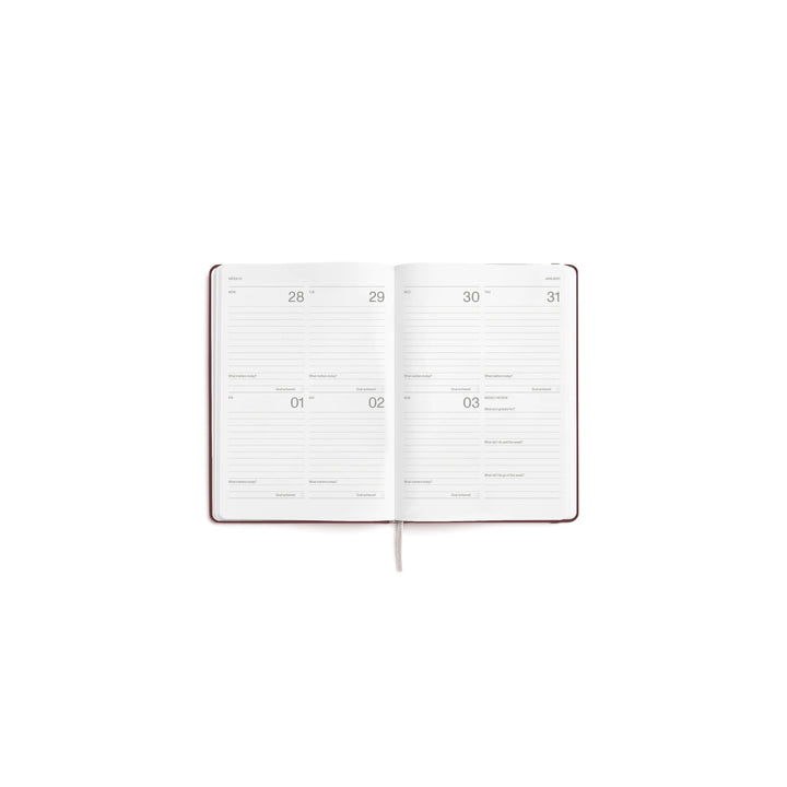 Wochenplaner 2027 – Steinpapier · A5 Hardcover · Burgundy | Karst